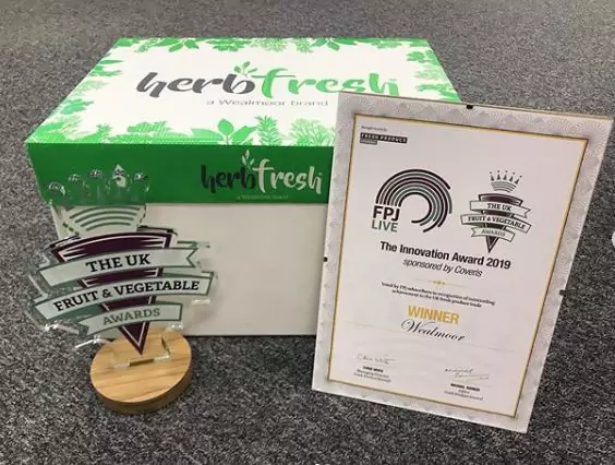 Herbfresh box, part of the Wealmoor brand. Shown with an innovation award and an industry award